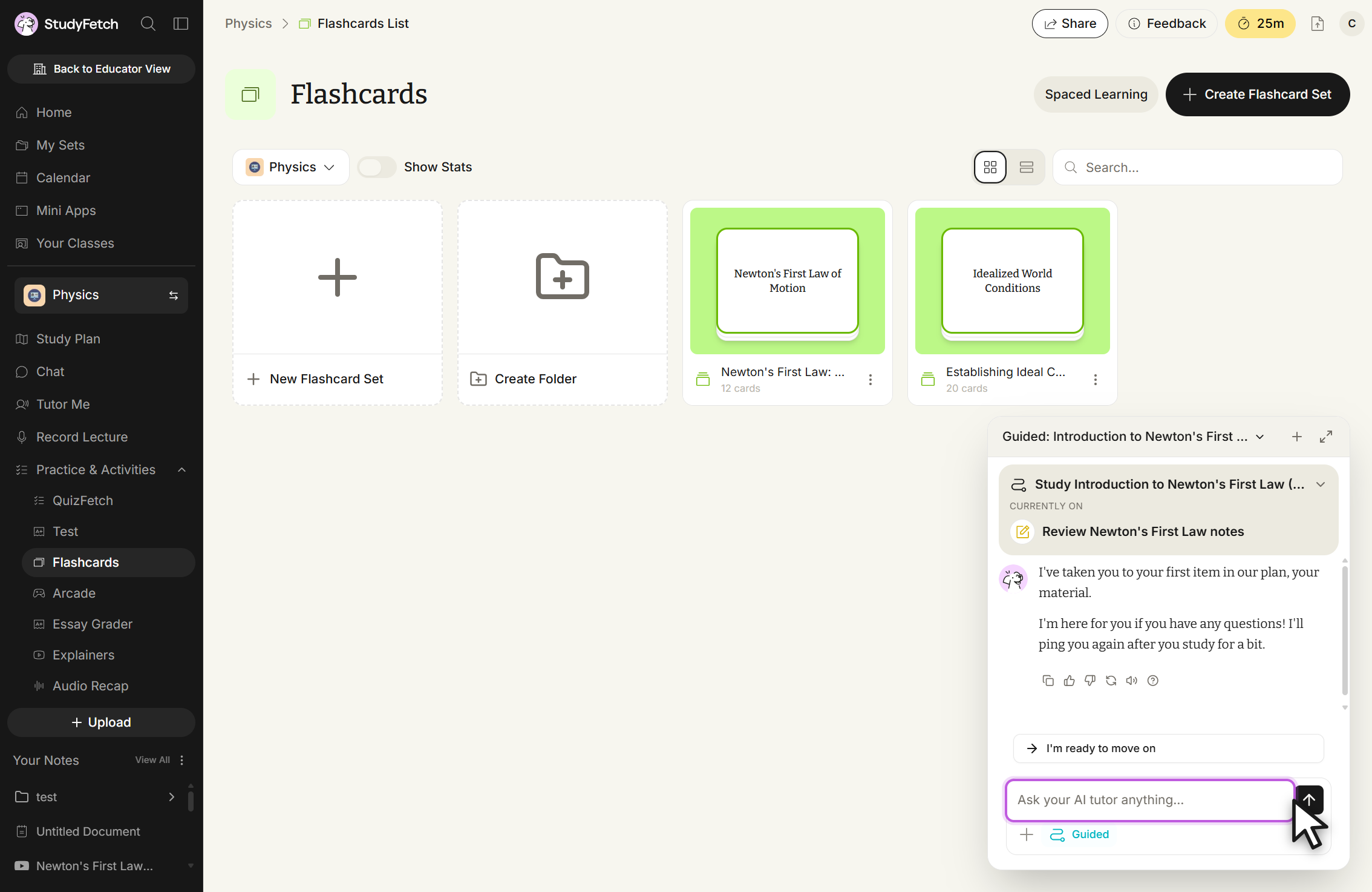 StudyFetch Flashcards page for the Physics class, reached from the Flashcards List breadcrumb, with Flashcards highlighted under Practice & Activities in the left sidebar. Spaced Learning and Create Flashcard Set buttons sit at the top right, and the grid shows New Flashcard Set, Create Folder, Newton's First Law: ... with 12 cards, and Establishing Ideal C... with 20 cards. A chat panel titled Guided: Introduction to Newton's First ... overlays the lower right, listing the plan step Review Newton's First Law notes under CURRENTLY ON, an assistant message, an I'm ready to move on button, and a message box with the placeholder Ask your AI tutor anything... The cursor rests on the send arrow.