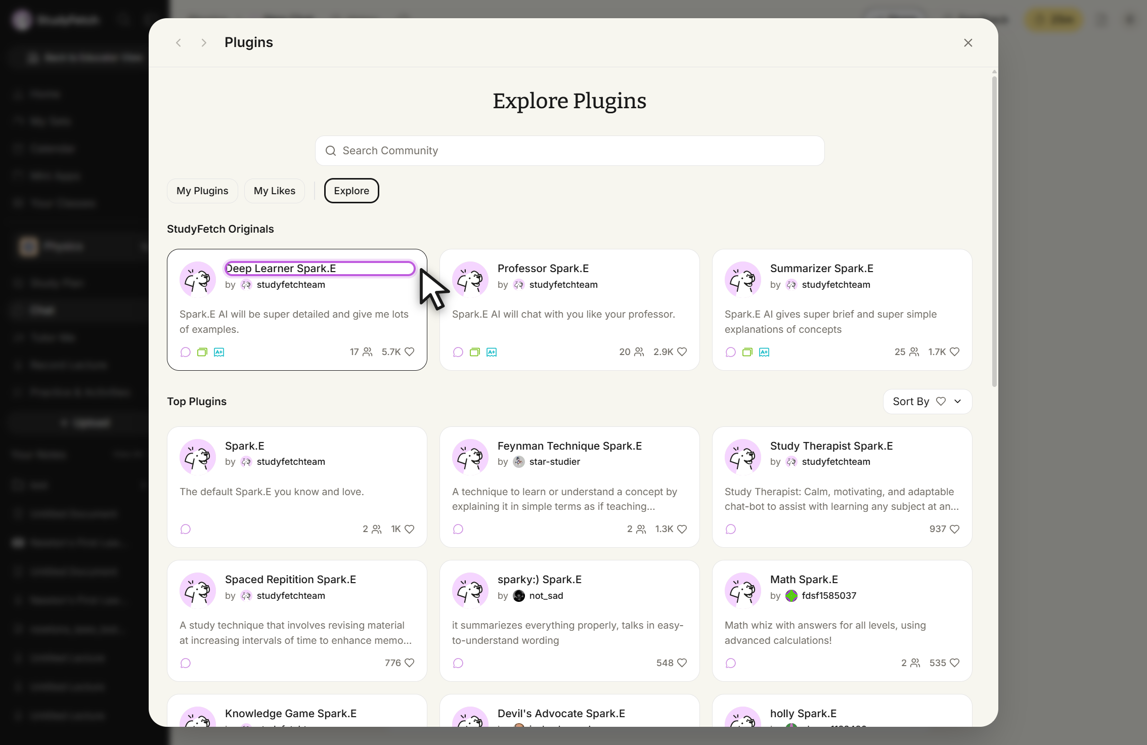 Plugins modal headed Explore Plugins, with a Search Community field and the tabs My Plugins, My Likes, and Explore, with Explore selected. StudyFetch Originals lists three cards: Deep Learner Spark.E by studyfetchteam, outlined with the cursor on it, Professor Spark.E by studyfetchteam, and Summarizer Spark.E by studyfetchteam. Top Plugins, with a Sort By control at the right, lists Spark.E, Feynman Technique Spark.E, Study Therapist Spark.E, Spaced Repitition Spark.E, sparky:) Spark.E, Math Spark.E, and a partly visible row of Knowledge Game Spark.E, Devil's Advocate Spark.E, and holly Spark.E.